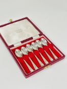 A Sheffield silver set of six coffee spoons complete with fitted case, show no signs of use,