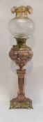 An Impressive American brass and rose gilt cast metal oil lamp, late 19th century, stamped The
