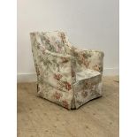 A late 19th century upholstered armchair, raised on square tapered supports moving on castors H84cm