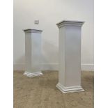 A pair of white painted pedestals of classical inspiration H83cm, 27cm x 27cm