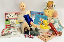 A collection of Vintage children's toys including a 1950's composition doll, two bath time ducks,