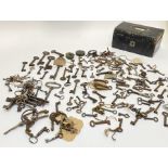 A collection of keys and padlocks, mainly 19th century, contained within a Victorian rexine