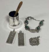 A pair of silver ingot pendants, a silver prize medal , a silver Opal set panel Australian