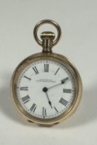 A Lady's gold plated Waltham of Massachusetts USA open face fob watch with white enamel dial and
