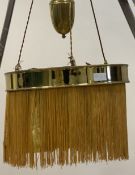 An Arts and Crafts style gilt brass rise and fall three branch pendent light fitting D47cm