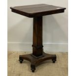 A William IV rosewood pedestal table, the rectangular top raised on a square tapered column on a