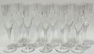 A set of ten cut-crystal glass champagne flutes (h- 23cm)