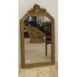A gilt painted wall mirror, early 20th century, the floral moulded frame with doe and acanthus