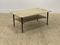 A Contemporary bleached walnut two tier coffee table, standing on tapered aluminium supports