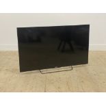 A 50" Sony Bravia flat screen HD TV with power cable and remote (untested)