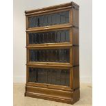 Globe Wernicke, an early 20th century oak four height stacking library bookcase, each tier with lead