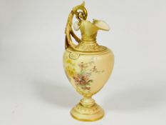 A Edwardian Royal Worcester blush ewer with C scroll handle to side of baluster form decorated