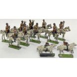 A group of lead painted toy soldier/band figures on horseback (11)