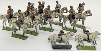 A group of lead painted toy soldier/band figures on horseback (11)