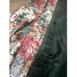 A large pair of glazed floral chintz curtains, box pleated and lined in green chintz, (300cm drop,