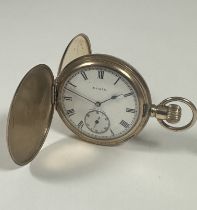 A Elgin USA Hunter gold plated presentation pocket watch with enamel dial and Roman numerals and