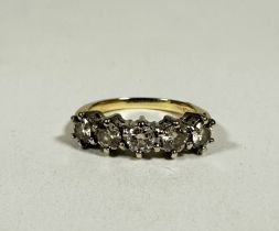A 18ct gold five stone Diamond ring mounted in white metal claw setting, approximately 1.5ct in