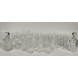 A collection of various glassware comprising twelve champagne flutes (tallest 16cm), eight wine