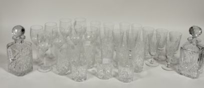 A collection of various glassware comprising twelve champagne flutes (tallest 16cm), eight wine