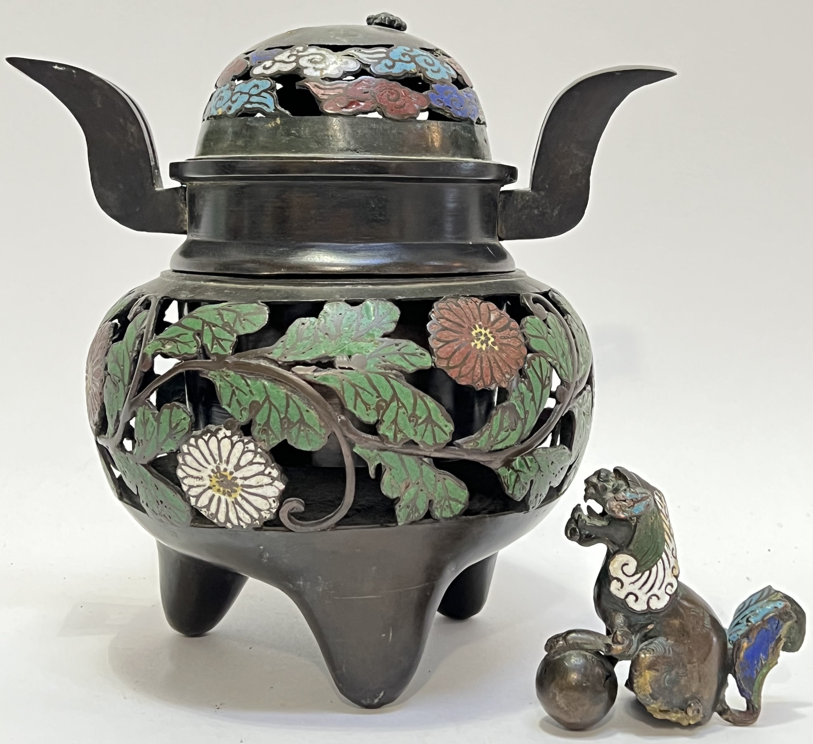 A Japanese bronze and champleve enamel tripod koro/incense burner with polychrome chrysanthemum