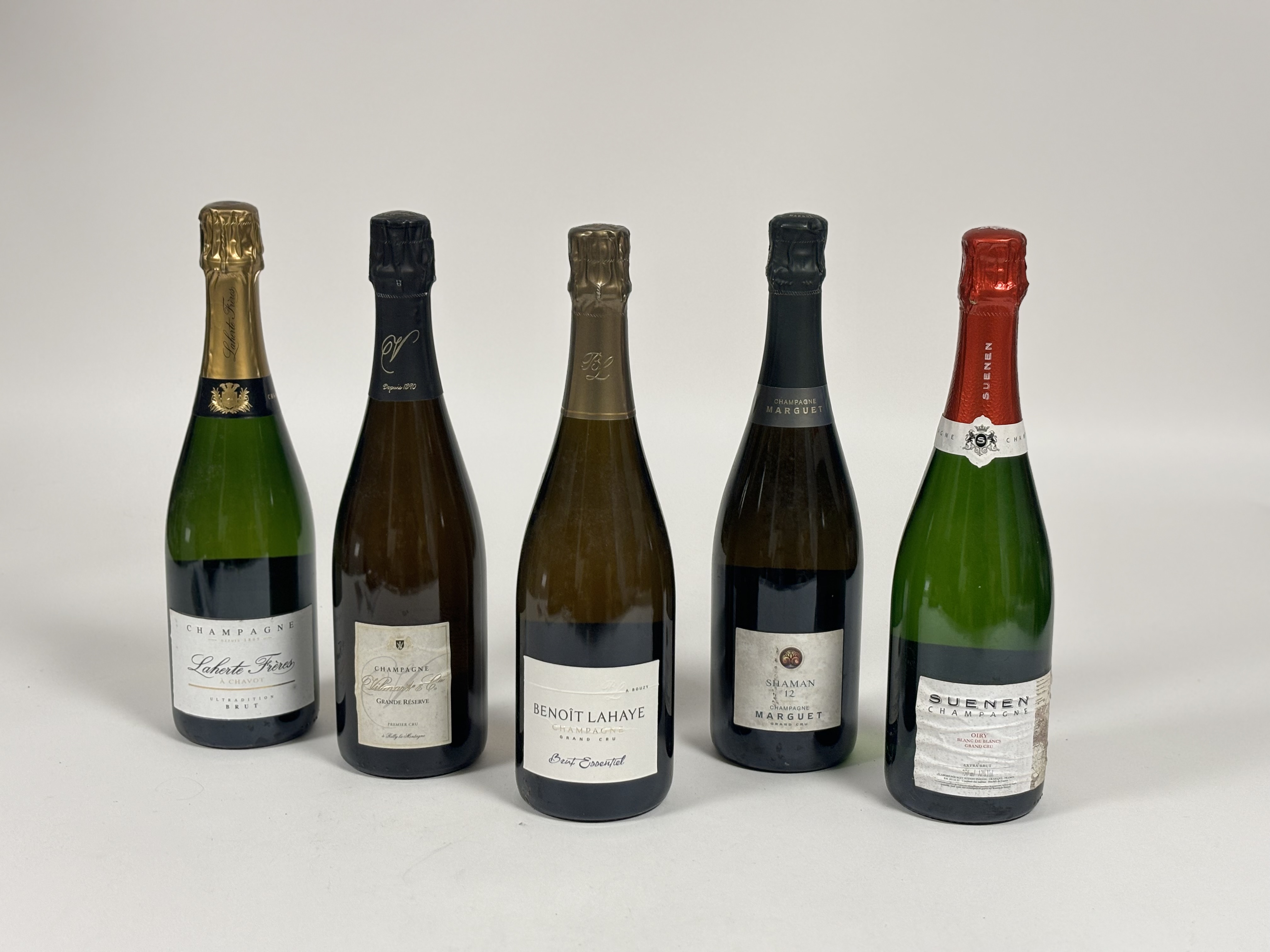 A group of five Champagne bottles comprising, Marguet Shaman 12 12.5% vol, Benoit Lahaye 12% vol,