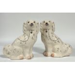 A pair of Flatback Chimney Spaniels, with crackled glaze and silver chain/collar and decoration. (h-