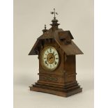 A late 19th century American mantel clock by Ansonia, the gilt brass mounted walnut case of