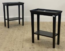 A pair of contemporary stained hardwood end tables, the tray top raised on square tapered supports