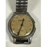 A Vintage Jaeger Le Coultre Gents chrome plated wrist watch with gilt dial and Arabic numerals and