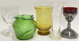 A mixed lot of glass comprising a Victorian clear glass goblet, a Loetz style Art Nouveau green
