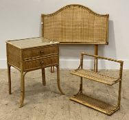 A Vintage bamboo and rattan bedside table, with plate glass top over two drawers, raised on