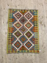 A Chobi kilim rug of overall geometric design 118cm x 87cm