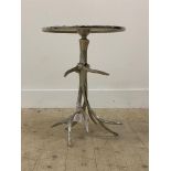 A cast aluminium occasional table, the circular top raised on supports formed as antlers. H53cm