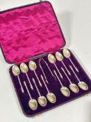 A Victorian London silver set of twelve apostle spoons and tongs in original fitted case, London
