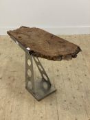 A burr elm and stainless steel end table. H63cm, L74cm, D39cm.