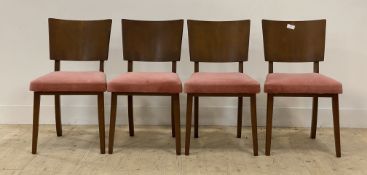 A set off our mid-century walnut veneered dining chairs, with shaped back above upholstered seat,