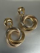 A pair of 18ct three coloured gold earrings with hinged crescent top with posts, (L x 3.5cm x W x