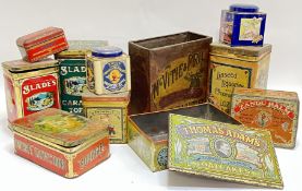 A group of vintage biscuit/tea tins including a McVitie & Price Biscuits sample tin with paper
