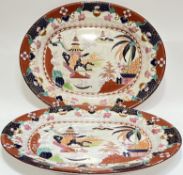 A pair of large Imari style Staffordshre pottery platters/ashets by William Brownfield & Sons (