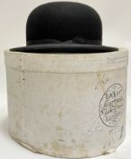 A boxed Lock & Co of London black Bowler hat (head hole 20cm x 16.5cm)