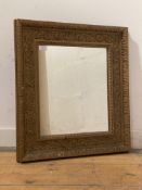 An early 20th century oak leaf and acanthus moulded gilt composition framed wall hanging mirror 58cm