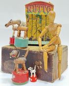 A group of vintage toys comprising a Nutto monkey mechanical toy (h- 22cm), and four model animals