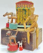 A group of vintage toys comprising a Nutto monkey mechanical toy (h- 22cm), and four model animals