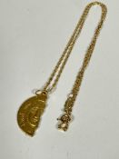 A Omani 18ct gold half portrait pendant with Arabic script to once side and Sempre Uniti verso,