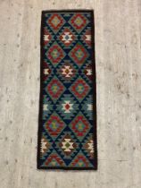 A Maimana kilim runner rug of characteristic design 190cm x 64cm