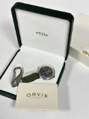 A Orvis chrome plated quartz Chronograph watch with black enamel dial and three subsidiaries dial
