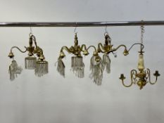 A pair of cast gilt brass three branch chandeliers with lustre drops, together with a matching
