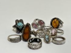 A collection of eleven various silver, white metal and gilt metal paste, Amber and Turquoise set