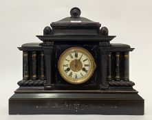 A late 19th century H.A.C. German ebonised mantel clock, the case, of Palladian form, with simulated