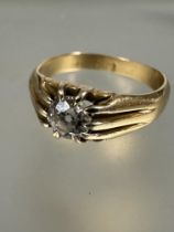 A 18ct gold Vintage solitaire old mine cut diamond ring mounted in ten claw setting, approximately